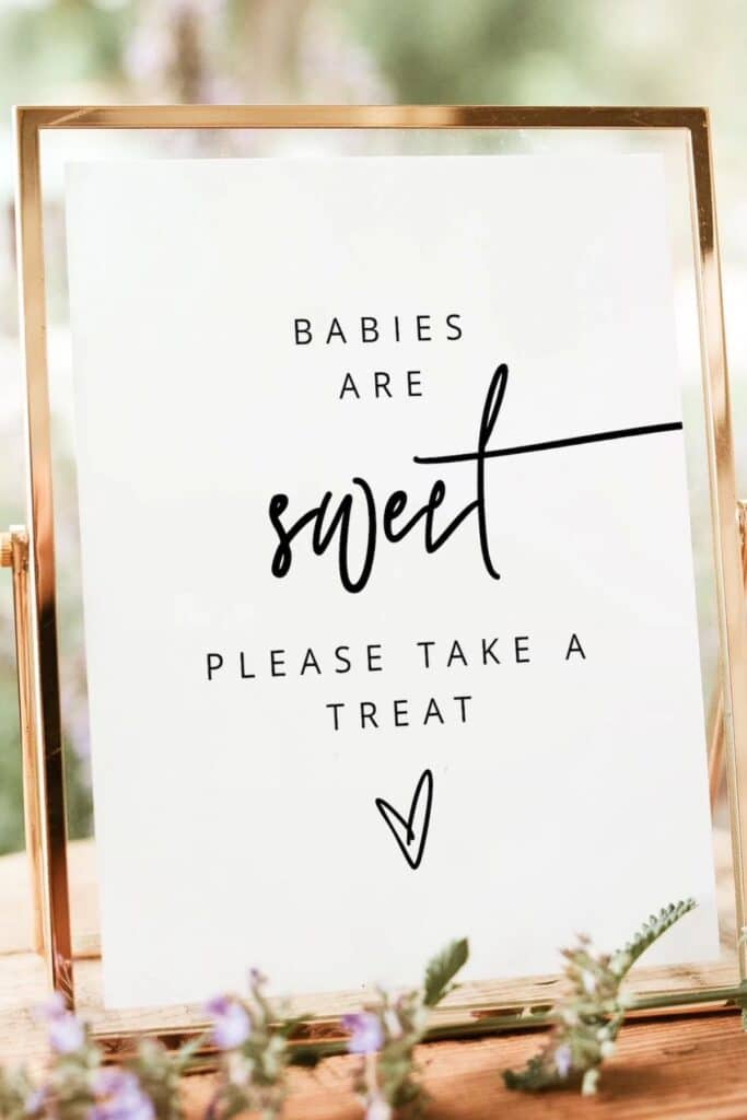 baby shower favors - dessert bar - sign that says "babies are sweet, please take a treat."