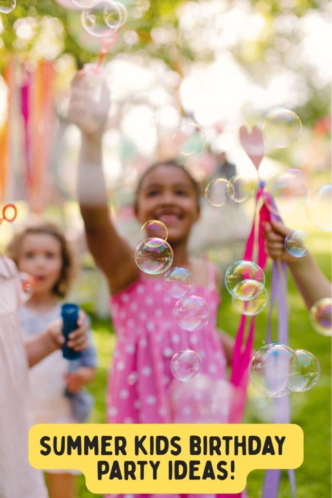 Kids blowing bubbles at an outdoor summer birthday party with colorful streamers in the background. Fun and playful backyard celebration for young children.