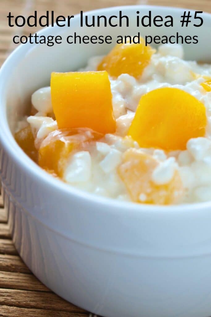 Cottage cheese with peach pieces in a white bowl — an easy, high-protein toddler lunch idea that’s healthy and picky-eater friendly.