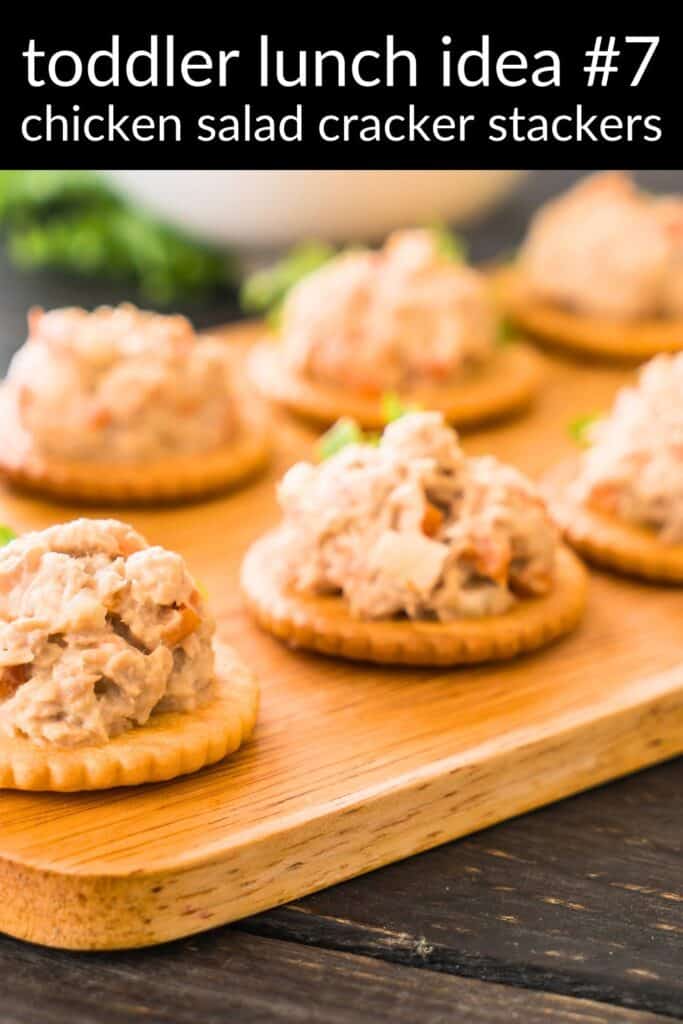 Chicken salad cracker stackers on a board — an easy, high-protein toddler lunch idea and kid-friendly finger food for daycare bentos.
