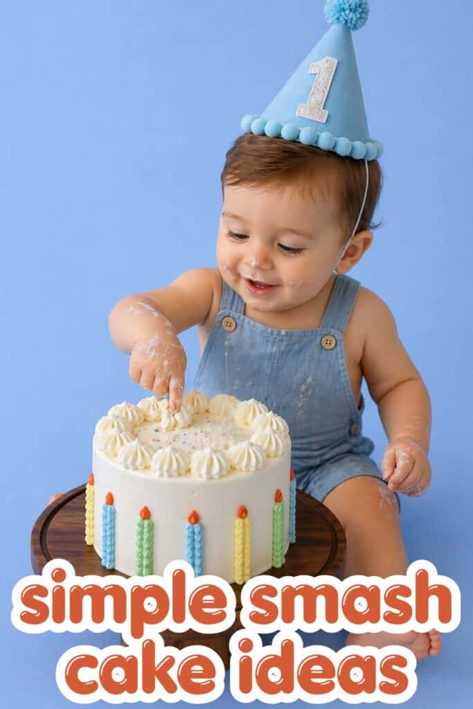 simple smash cake boy first birthday baby eating cake blue outfit and party hat photoshoot