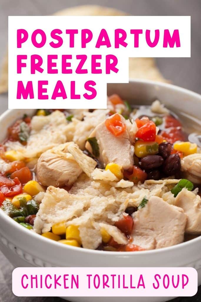 Chicken Tortilla Soup: Bowl of chicken tortilla soup with black beans and corn, an easy postpartum freezer meal